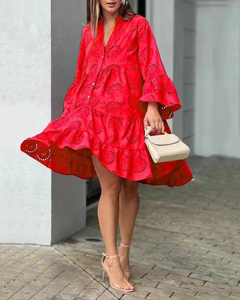 Fashionable women's embroidered mini dress with tiered skirt, V-neck, and trendy bell sleeves.