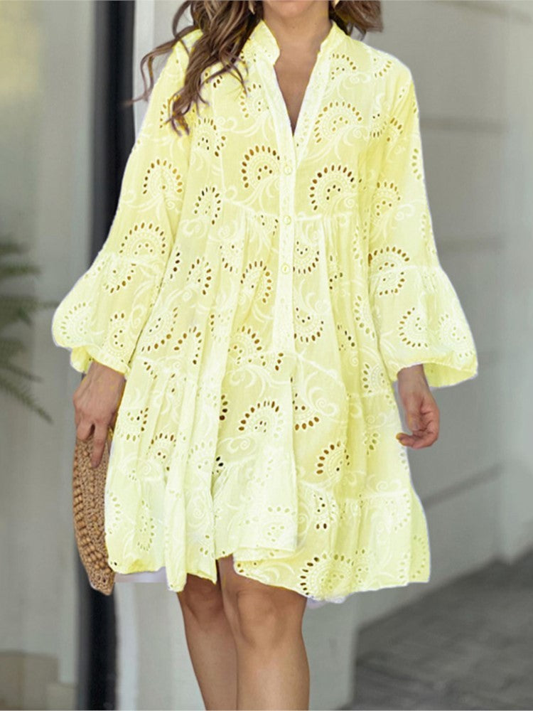 Elegant women's party mini dress, V-neck, tiered, with intricate embroidery and flowy bell sleeves.