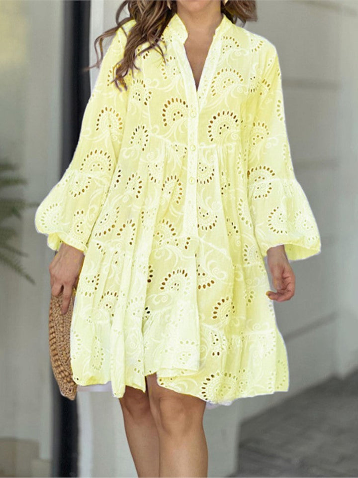 Elegant women's party mini dress, V-neck, tiered, with intricate embroidery and flowy bell sleeves.