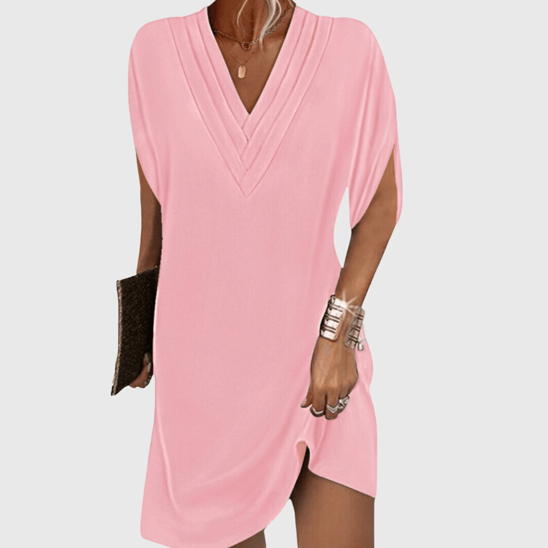 Chic flowy V-neck dress for women, elegant and comfortable. Versatile for casual outings or evening events.