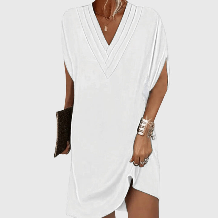 Versatile elegant women's dress, flowy design with tummy control. Flattering V-neck, perfect for casual to evening.