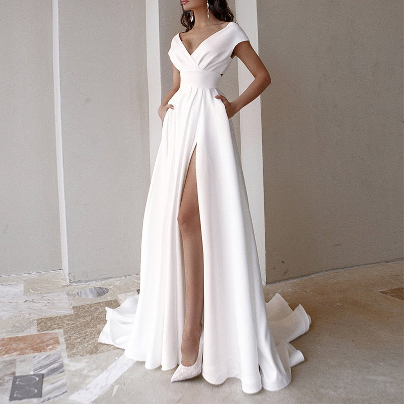 Elegant V-neck women's evening dress with high slit, floor-length. Ideal for formal parties and events.