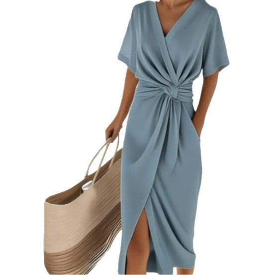Stylish women's summer wrap dress, V-neck, elegant midi length, and a comfortable side slit.