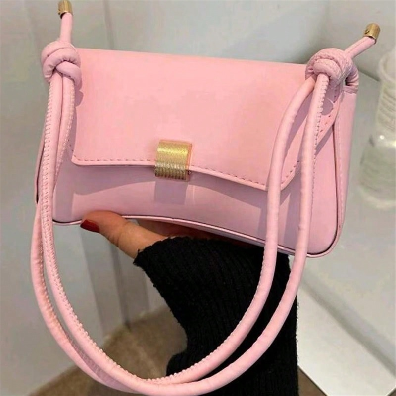 Classic women's vintage style flap shoulder bag, compact design, perfect elegant fashion accessory.