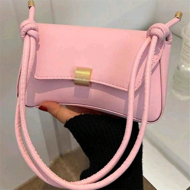 Classic women's vintage style flap shoulder bag, compact design, perfect elegant fashion accessory.
