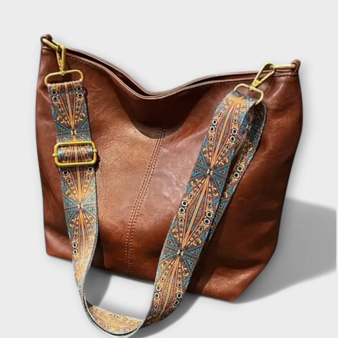 Elegant vintage women's shoulder bag, classic design. Perfect everyday handbag and fashion accessory for timeless style.