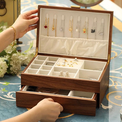 Elegant walnut wood jewelry box with soft velvet lining, perfect for unisex storage & organization.