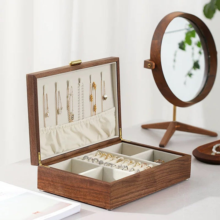Sophisticated walnut wood jewelry organizer, ideal for gifting, with a protective velvet interior.