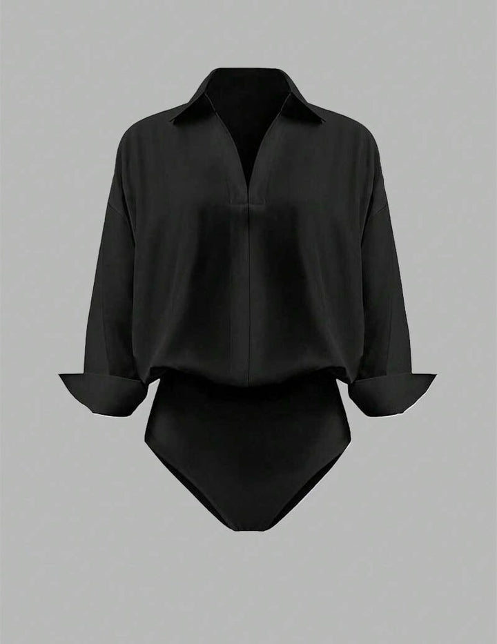 Stylish yellow long sleeve bodysuit with draped collar, ideal for a smart casual or elegant outfit.