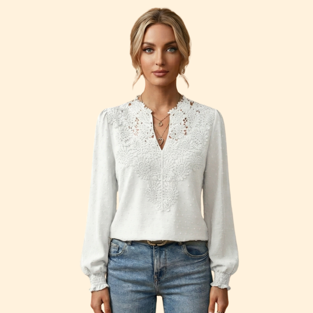 Elegant women's blouse featuring intricate lace and delicate embroidery, a versatile and fashionable wardrobe staple.