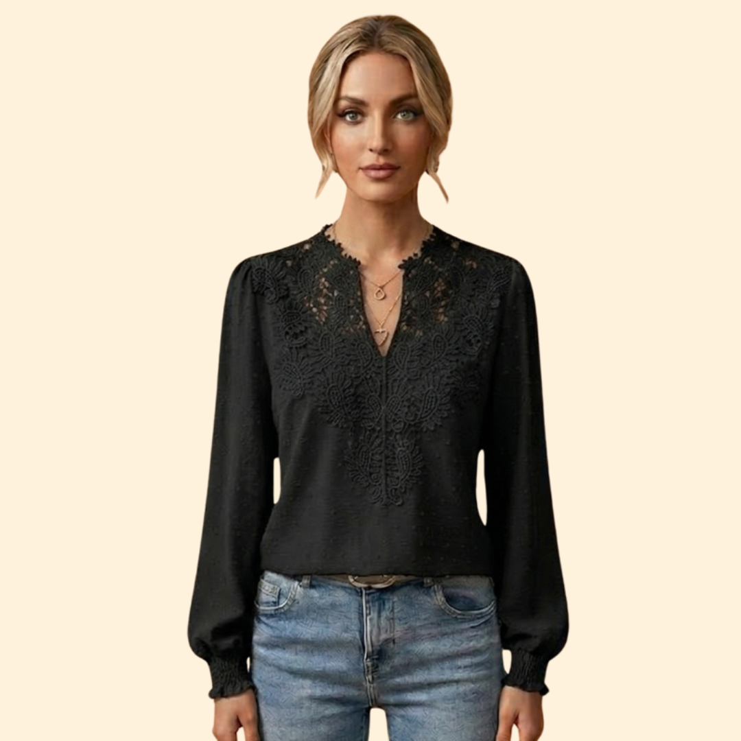 Flattering fit women's elegant lace blouse with delicate embroidery, suitable for both formal and casual wear.