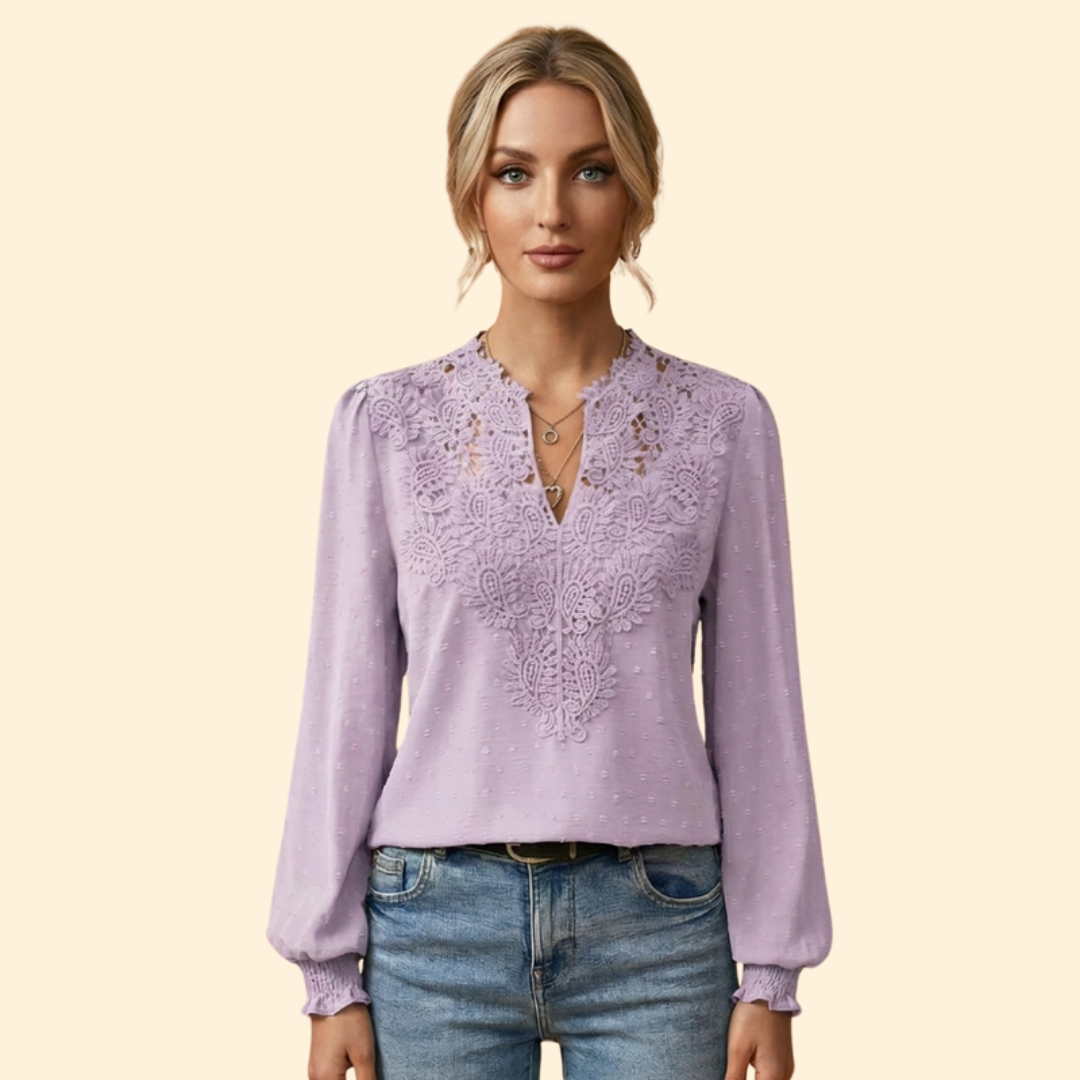 Soft, delicate lace and embroidered women's blouse, offering a comfortable yet elegant and versatile fashion statement.