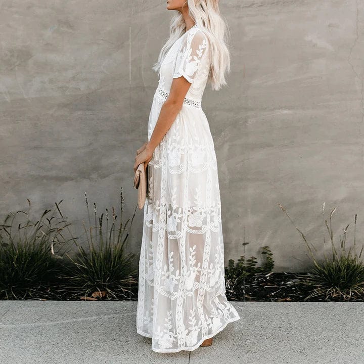 Flowy white lace maxi dress for women, ideal for elegant summer evenings or special occasions. Casual chic V-neck style.