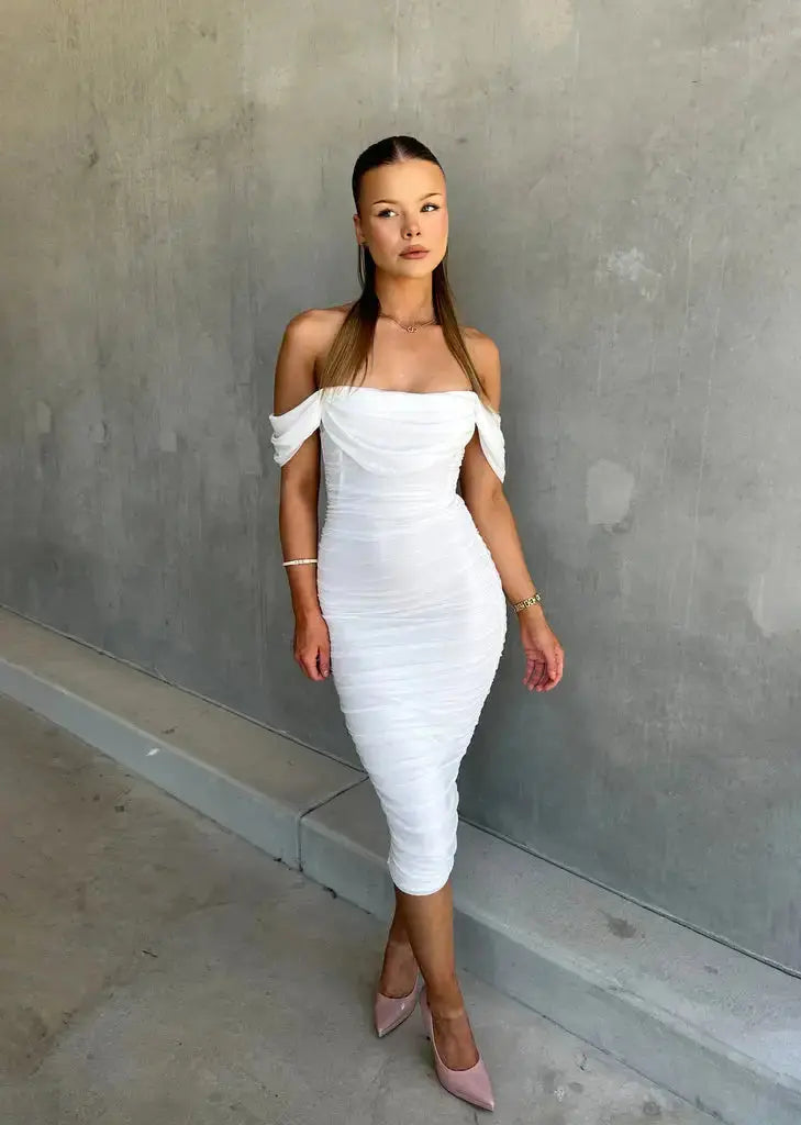 Chic white off-shoulder midi bodycon dress for women. Ideal elegant party, cocktail, or special occasion wear.