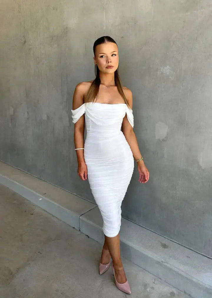 Chic white off-shoulder midi bodycon dress for women. Ideal elegant party, cocktail, or special occasion wear.