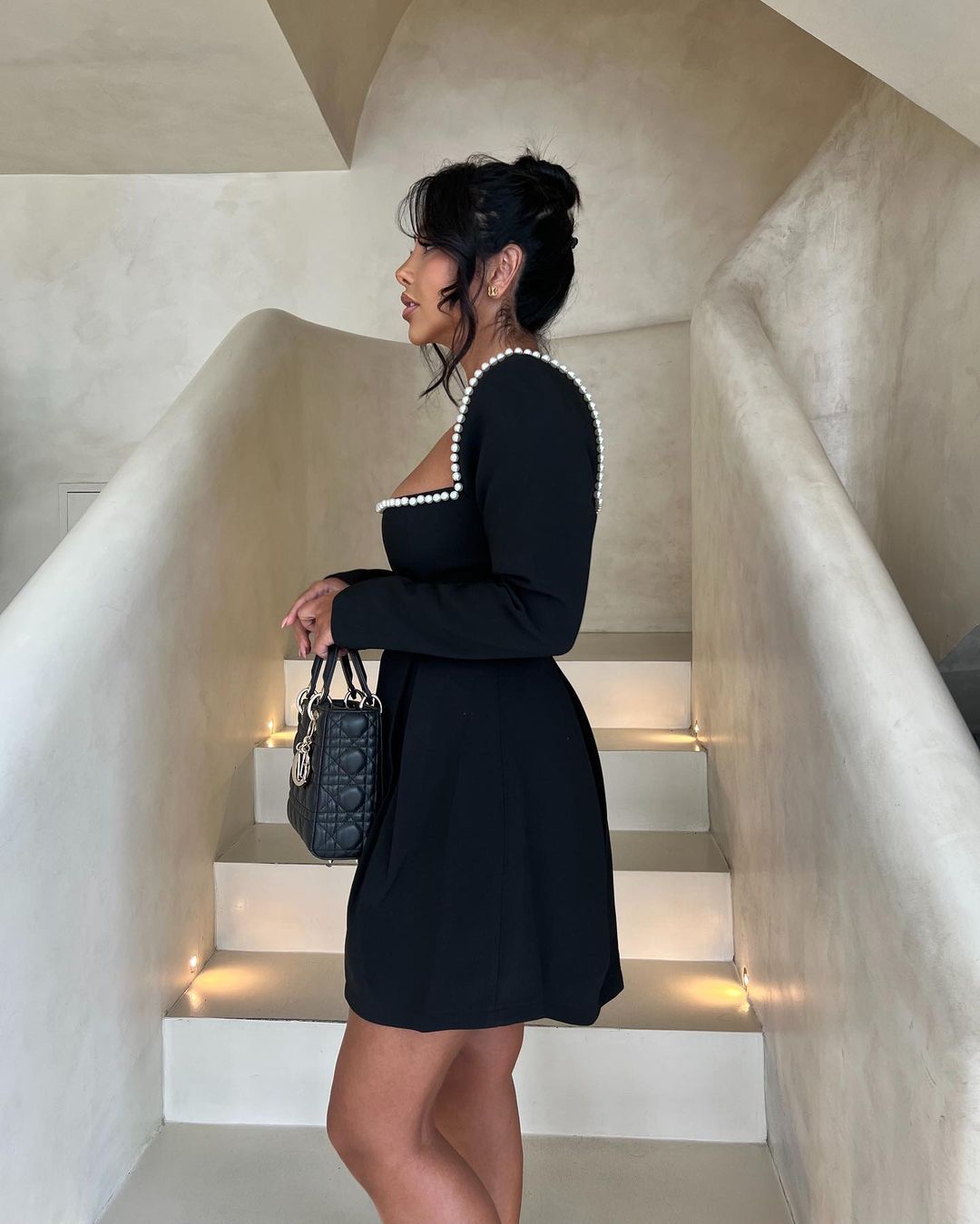 Luxurious pearl-embellished women's evening dress, featuring chic puff sleeves and an elegant square neckline.