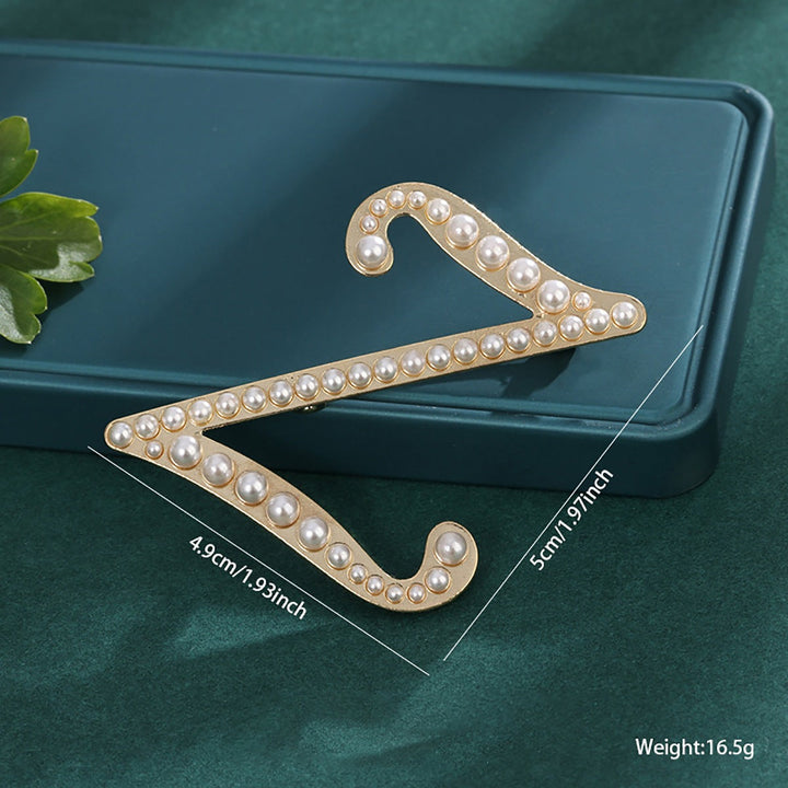 White pearl hair clip, a timeless and chic accessory for women.