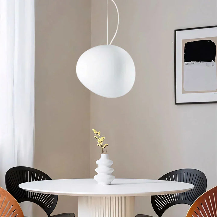 Elegant white pebble pendant light. Modern ceiling lamp for minimalist decor & home lighting fixture.