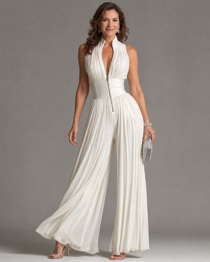 Elegant white pleated halter neck wide leg jumpsuit for women, perfect for chic summer and evening occasions.