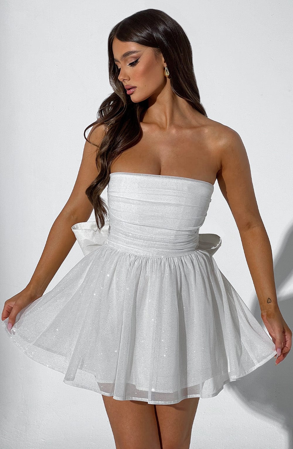 Stylish strapless A-line mini party dress, a must-have for a chic feminine look.