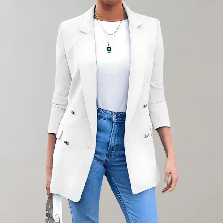 Women's professional white tailored blazer, a chic workwear jacket. Ideal for office fashion and elegant attire.