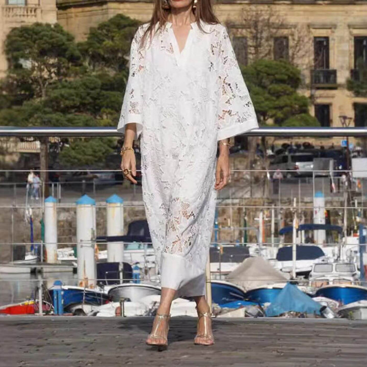 Casual white women's loose sleeve maxi dress, lightweight & elegant, featuring a comfortable V-neck for summer.
