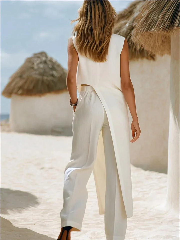 Stylish white wide leg pants and sleeveless wrap top set for women. A comfortable & elegant casual or resort outfit.