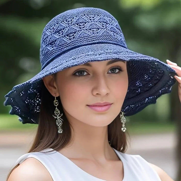 Chic non-woven wide brim sun hat for women. A casual yet elegant summer accessory with UV protection.