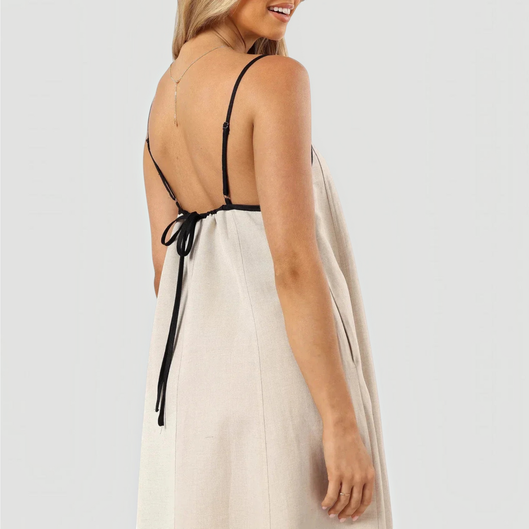 Women's Willow elegant midi dress, a perfect summer dress for casual wear, showcasing an A-line silhouette.