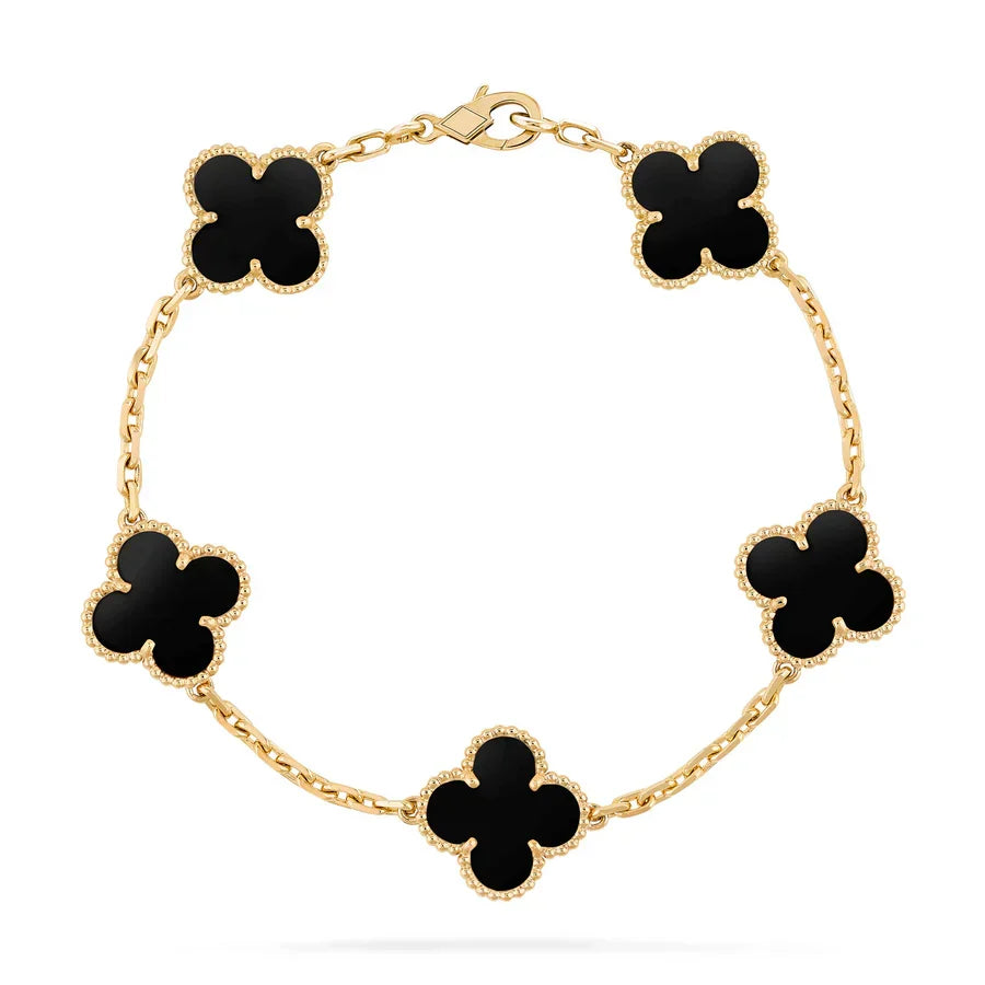 Delicate 18k gold-plated clover leaf design bracelet. Elegant women's fashion jewelry, adjustable fit.