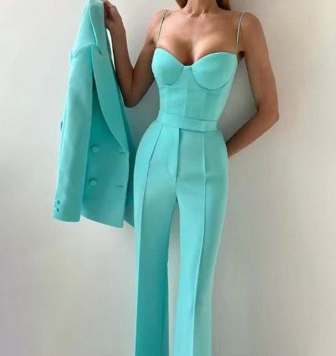 Stylish women's elegant 3-piece high-waist suit set. Professional blazer, camisole & flared trousers for business.