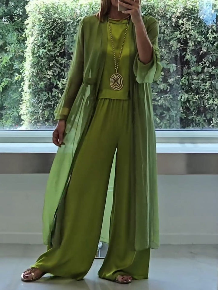 Elegant women's 3-piece green lounge set with wide-leg pants & cardigan for comfort and style. Relaxed fit leisure wear.