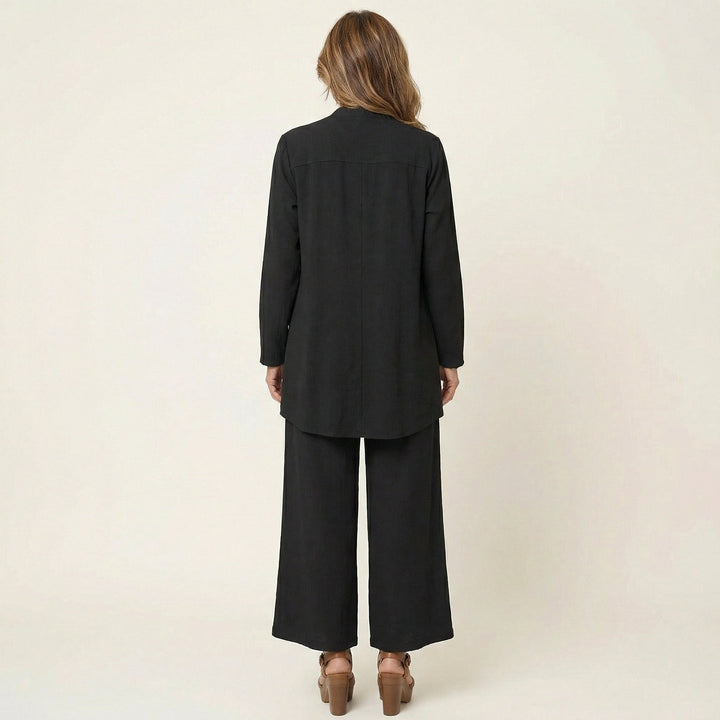 Stylish women's minimalist 3-piece set; comfortable wide-leg trousers, tailored vest & matching blouse.