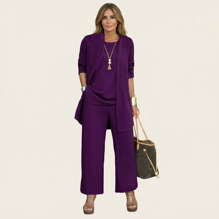 Sophisticated women's 3-piece set. Elegant vest, classic blouse, and comfortable wide-leg trousers.