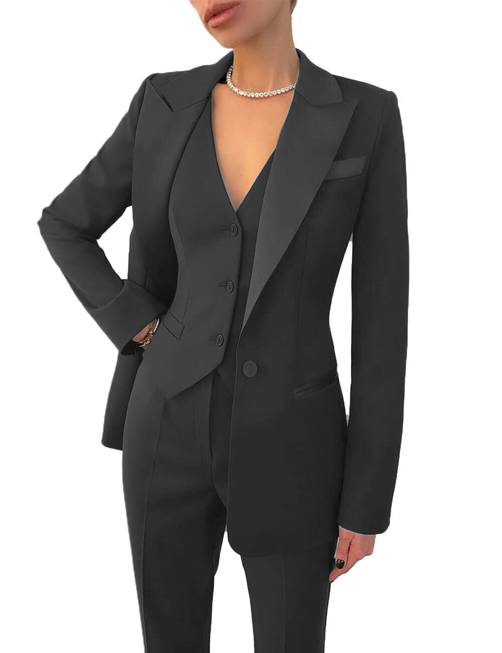 Chic women's vest & tailored trousers from an elegant 3-piece suit. Ideal for professional office & formal wear.