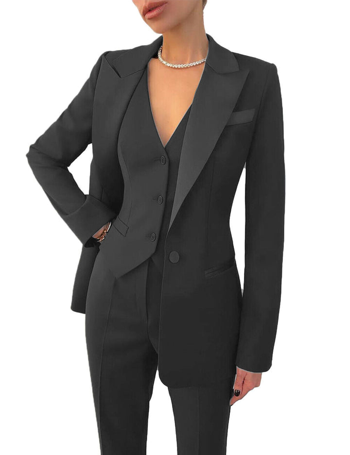Chic women's vest & tailored trousers from an elegant 3-piece suit. Ideal for professional office & formal wear.