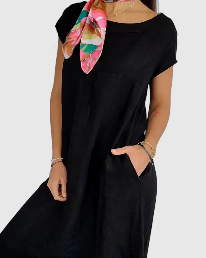 Versatile women's A-line dress, chic design with pockets, ideal for comfortable daily wear.