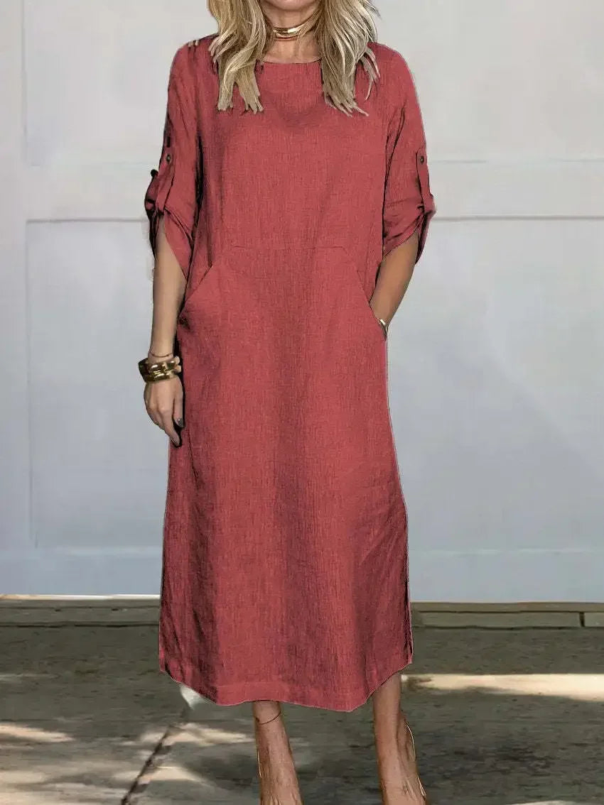 Detailed view of an elegant draped A-line evening dress for women. Highlighting fabric and loose fit.