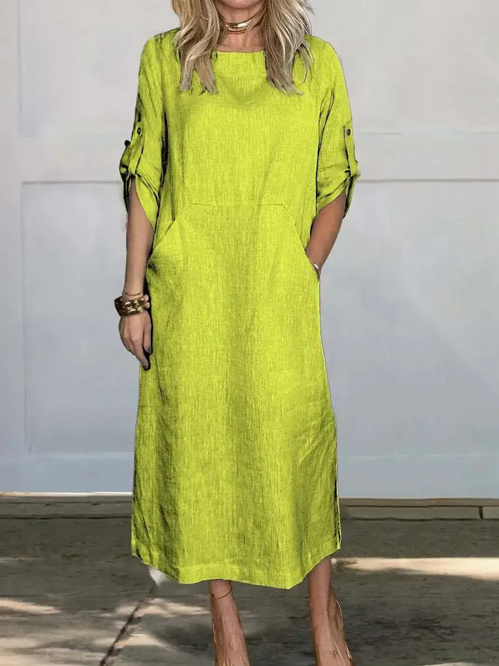 Full length shot of an elegant women's draped A-line evening dress, suitable for evening and party wear.