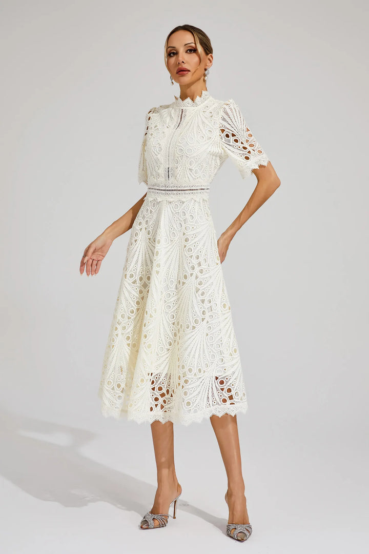 Front view of a women's elegant A-line lace midi dress with fit & flare silhouette & mock neck.