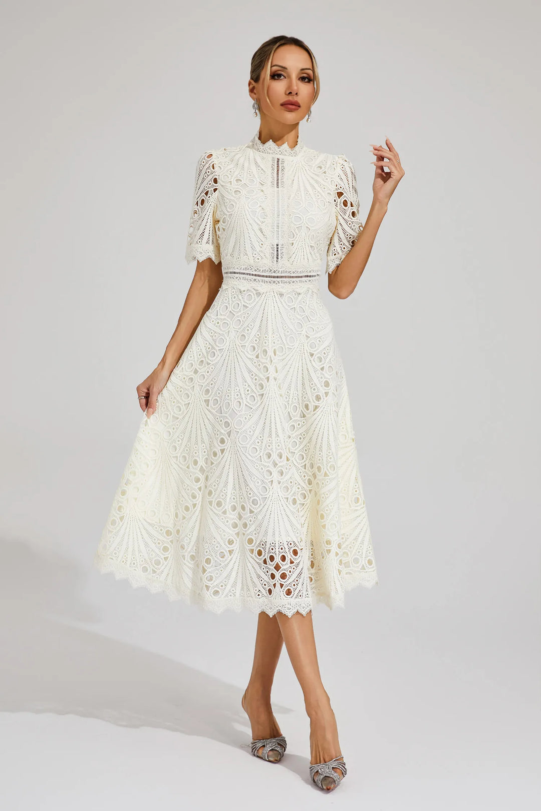 Elegant women's lace midi dress featuring a chic cutout waist & flattering A-line fit & flare style.