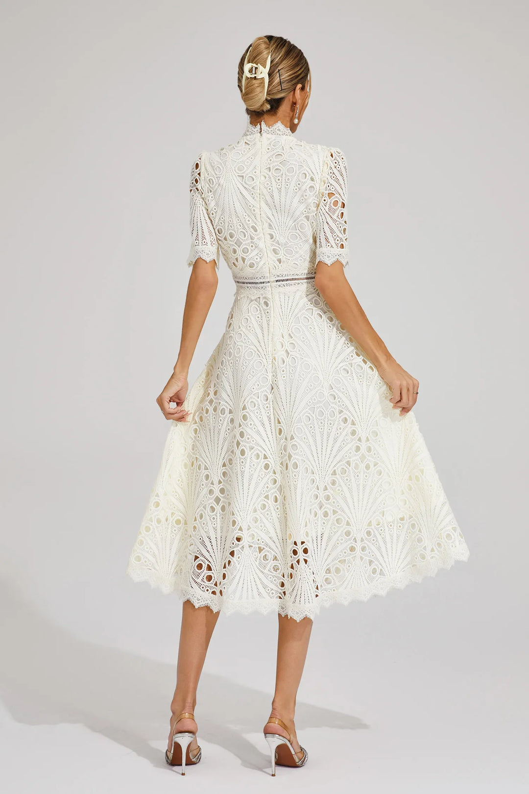 Intricate lace fabric defines this women's elegant A-line midi dress, fit & flare, short sleeve design.