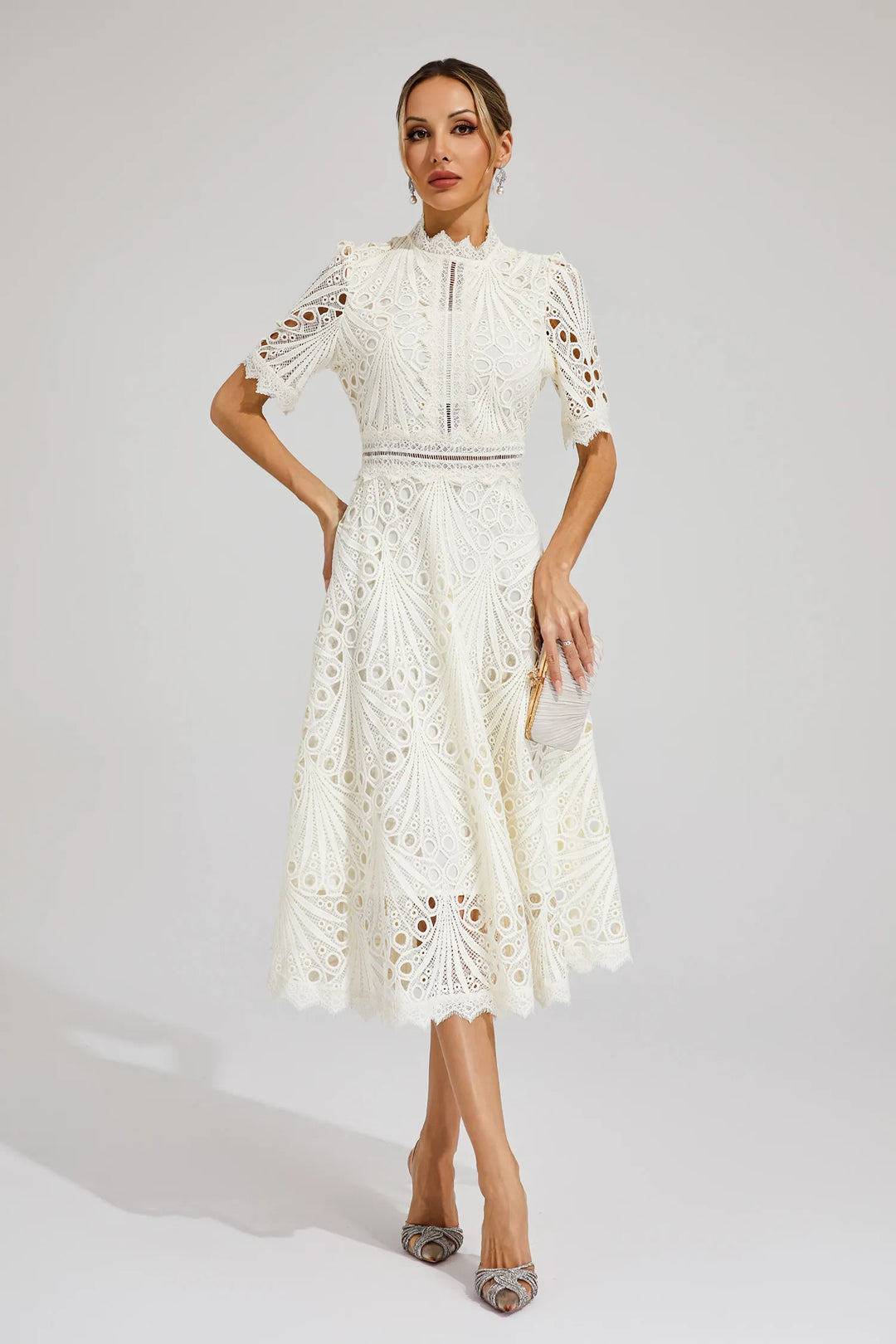 Women's sophisticated lace A-line midi dress, fit & flare silhouette, ideal for elegant cocktail parties.