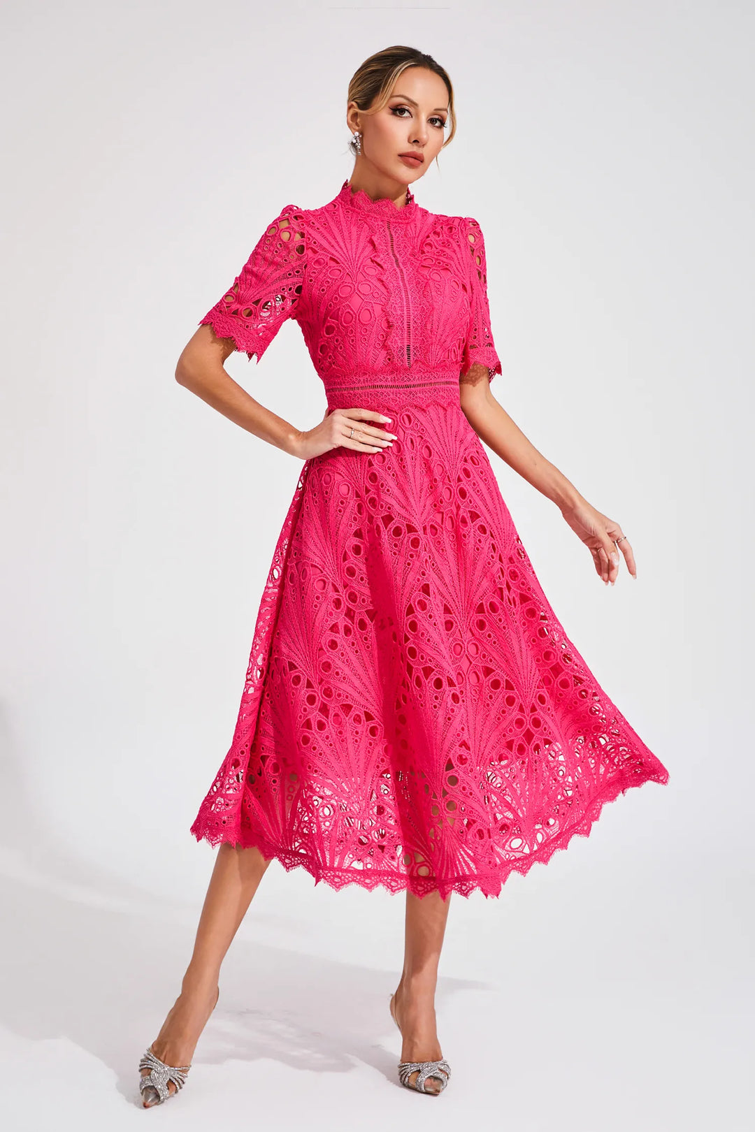 Model in elegant women's lace midi dress, A-line fit, perfect for cocktail or special events.