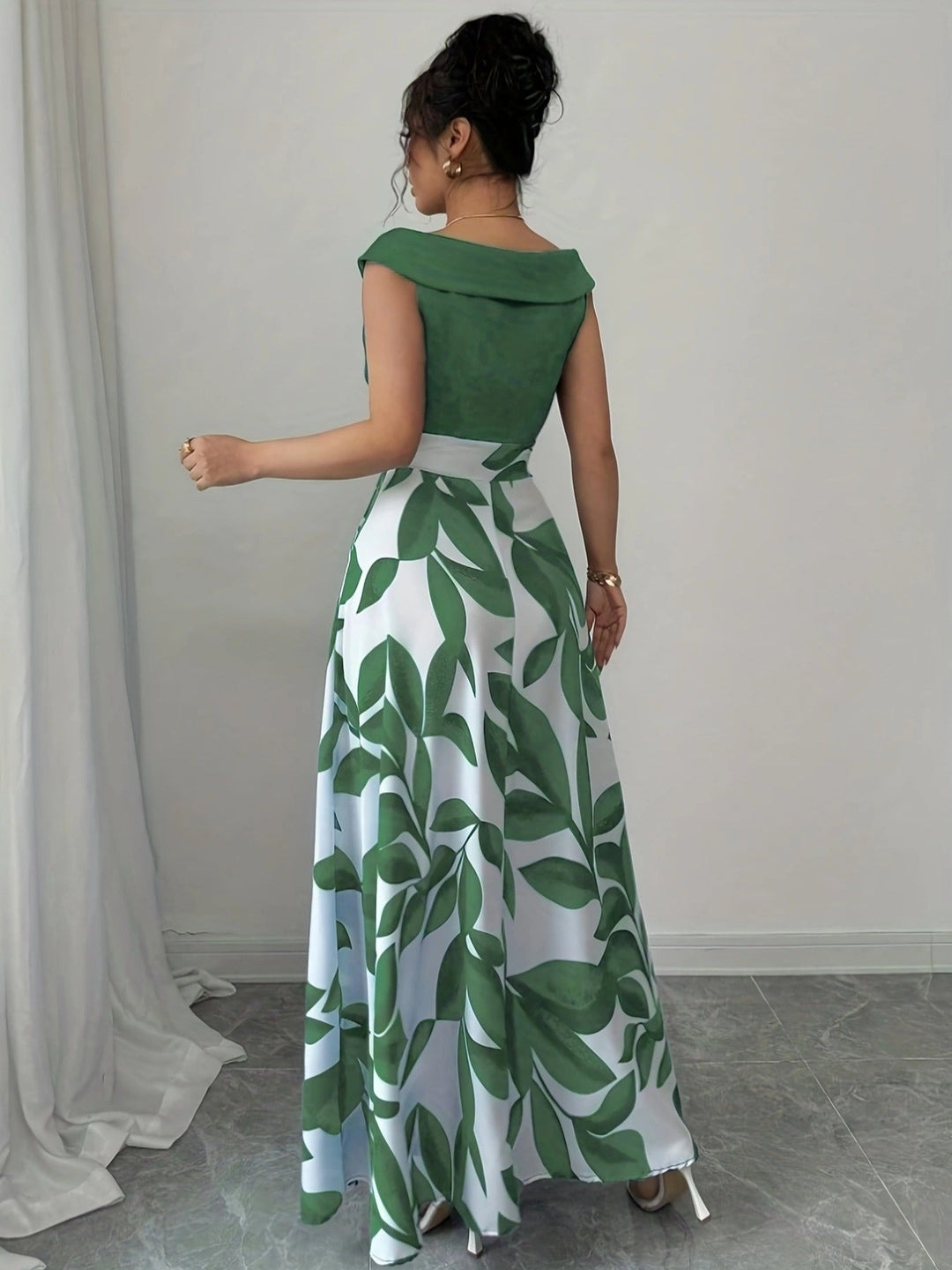 Flowing A-line maxi dress for women, exuding elegance for wedding guests & formal events. Sophisticated party wear.