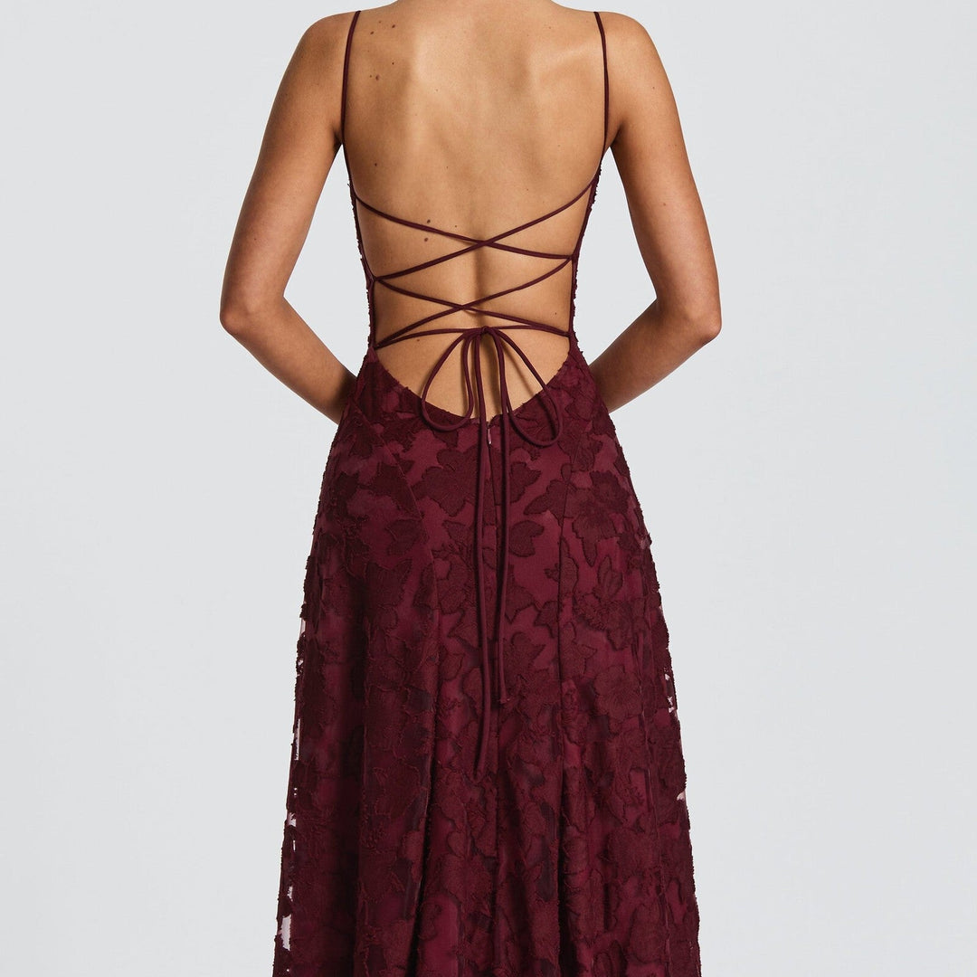 Elegant women's ruched spaghetti strap A-line maxi dress. Ideal for formal events & stylish occasions.
