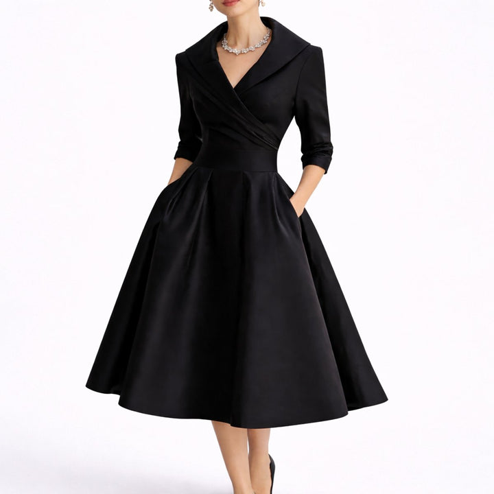 Elegant women's A-line midi dress, perfect fall wedding guest outfit. Structured V-neck with three-quarter sleeves.