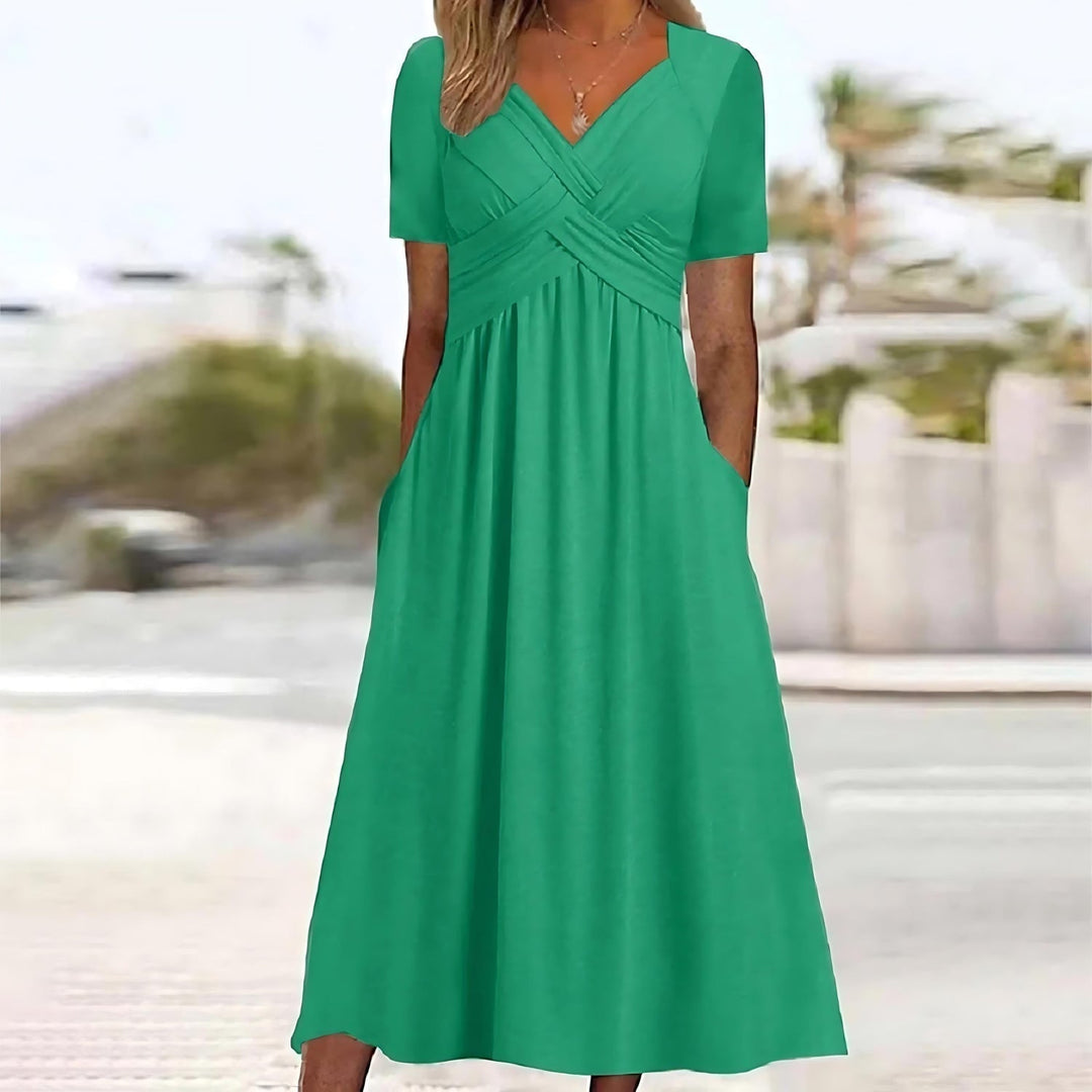 Elegant women's A-line midi dress, perfect for any occasion. Comfortable and chic fashion style.