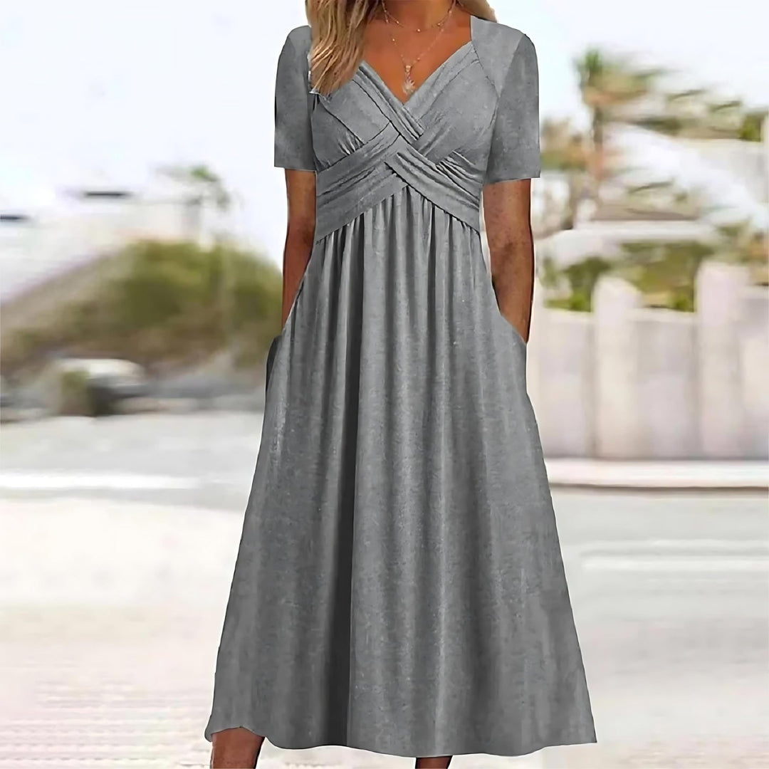 Comfortable women's A-line midi dress. Elegant and chic design for modern fashion. Easy to wear.
