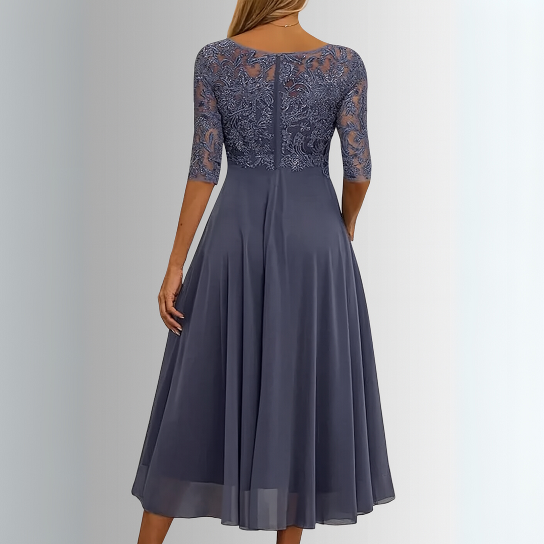Women's elegant A-line midi dress with intricate embroidery, a flattering & chic choice for any special occasion.